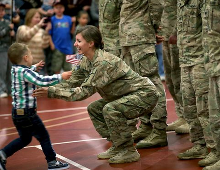 Toddler ignores military protocol, greets mom